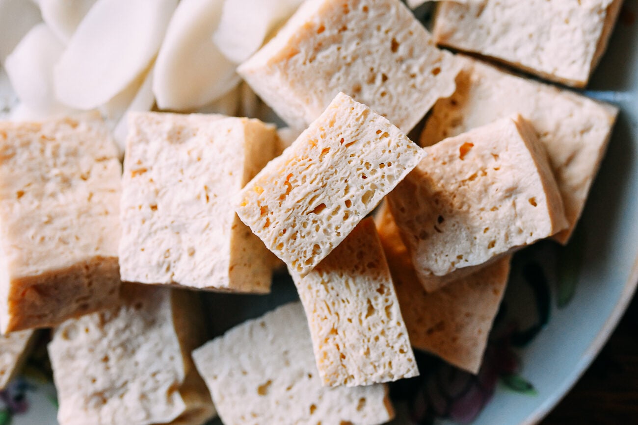 Frozen tofu with rice cakes on plate for hot pot