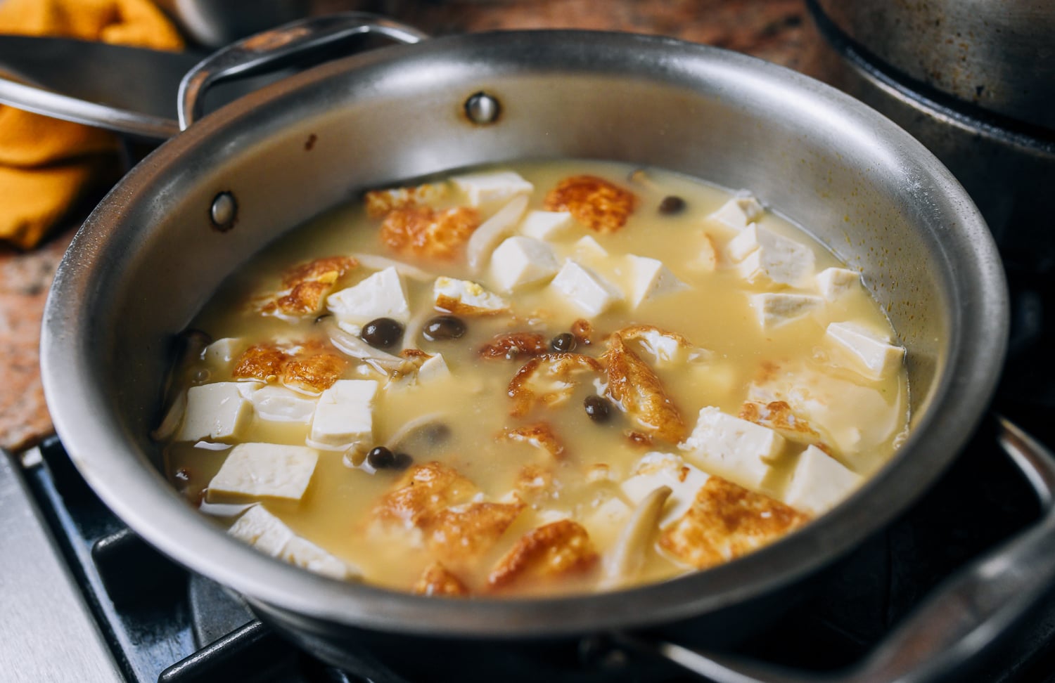 tofu, egg, and mushroom in soup