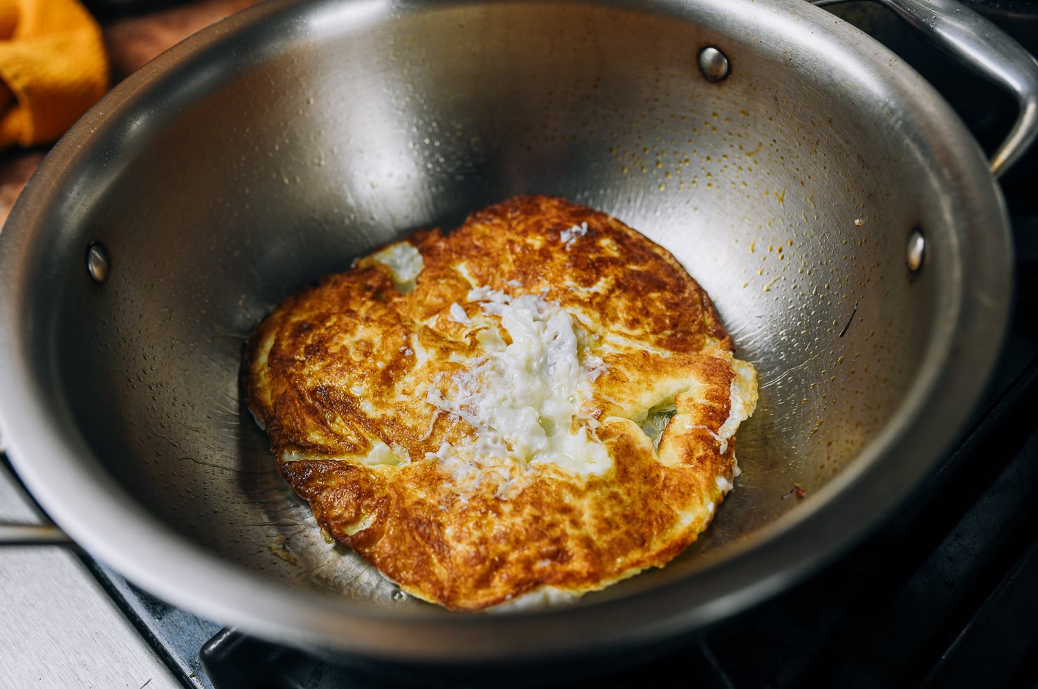 browned fried eggs in pot