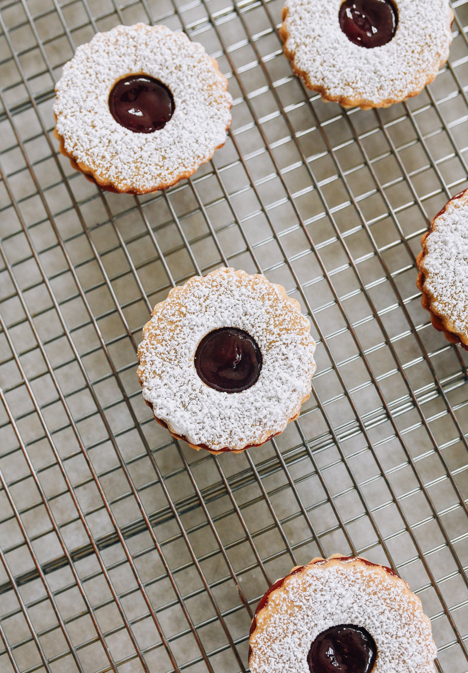 linzer cookies on baking rack