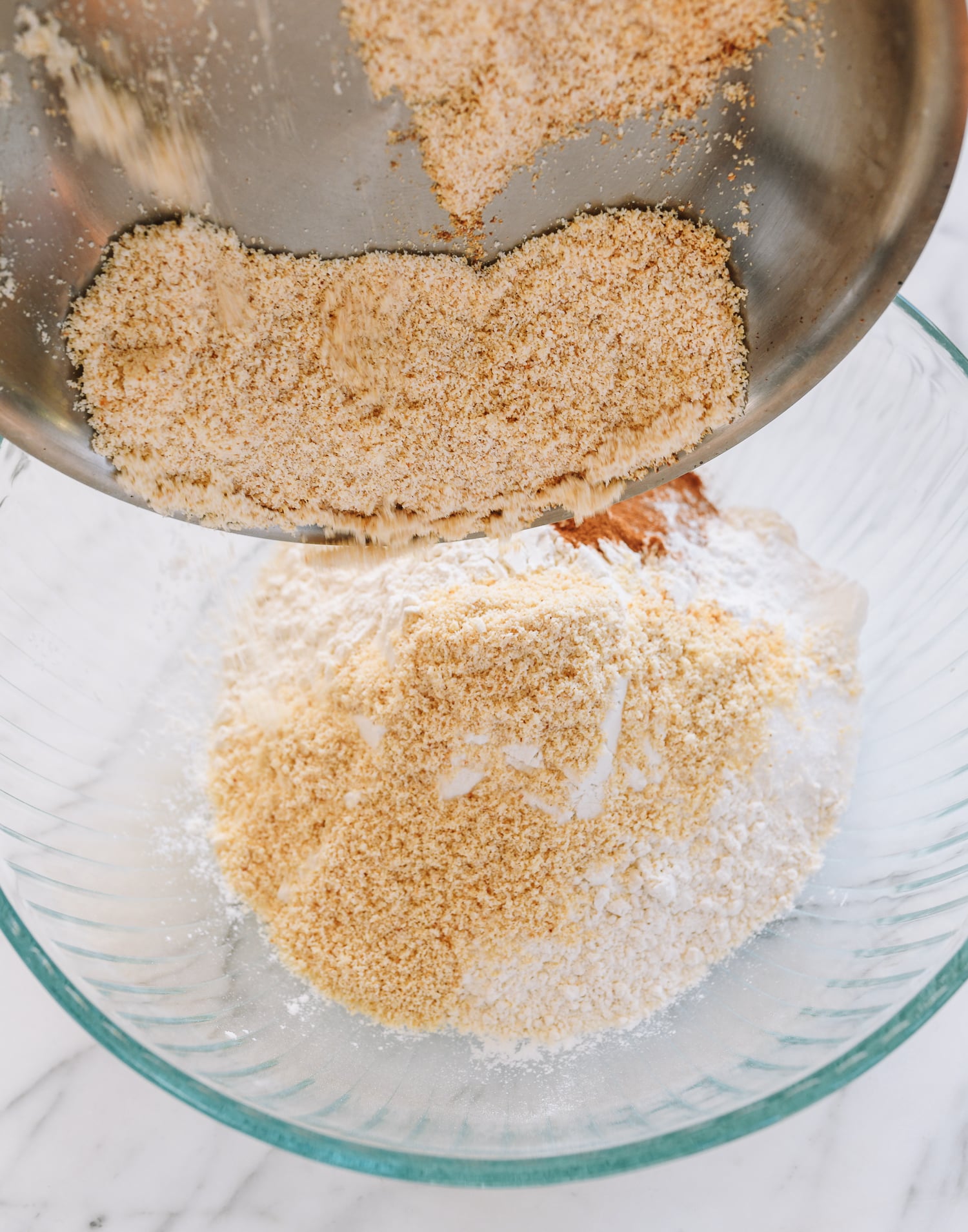 combining dry ingredients for linzer cookies