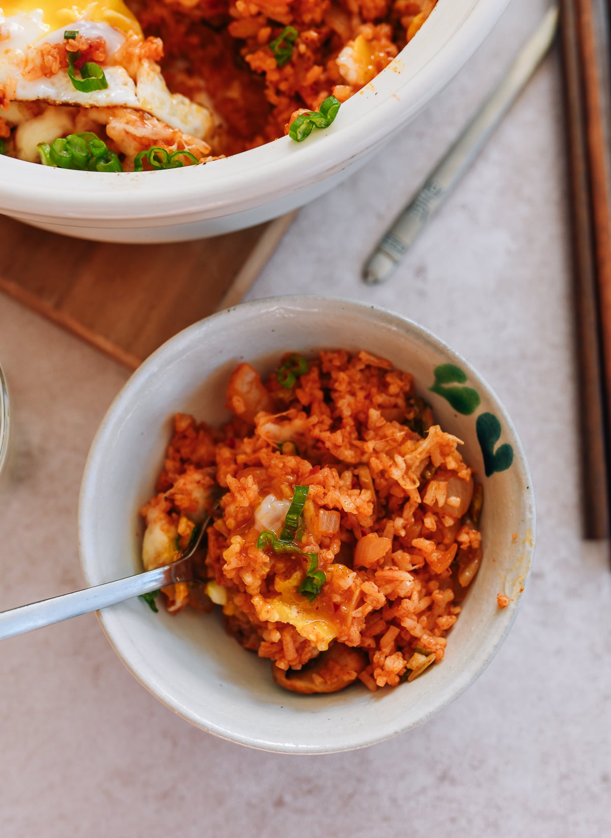 cheesy kimchi rice scooped into a small bowl