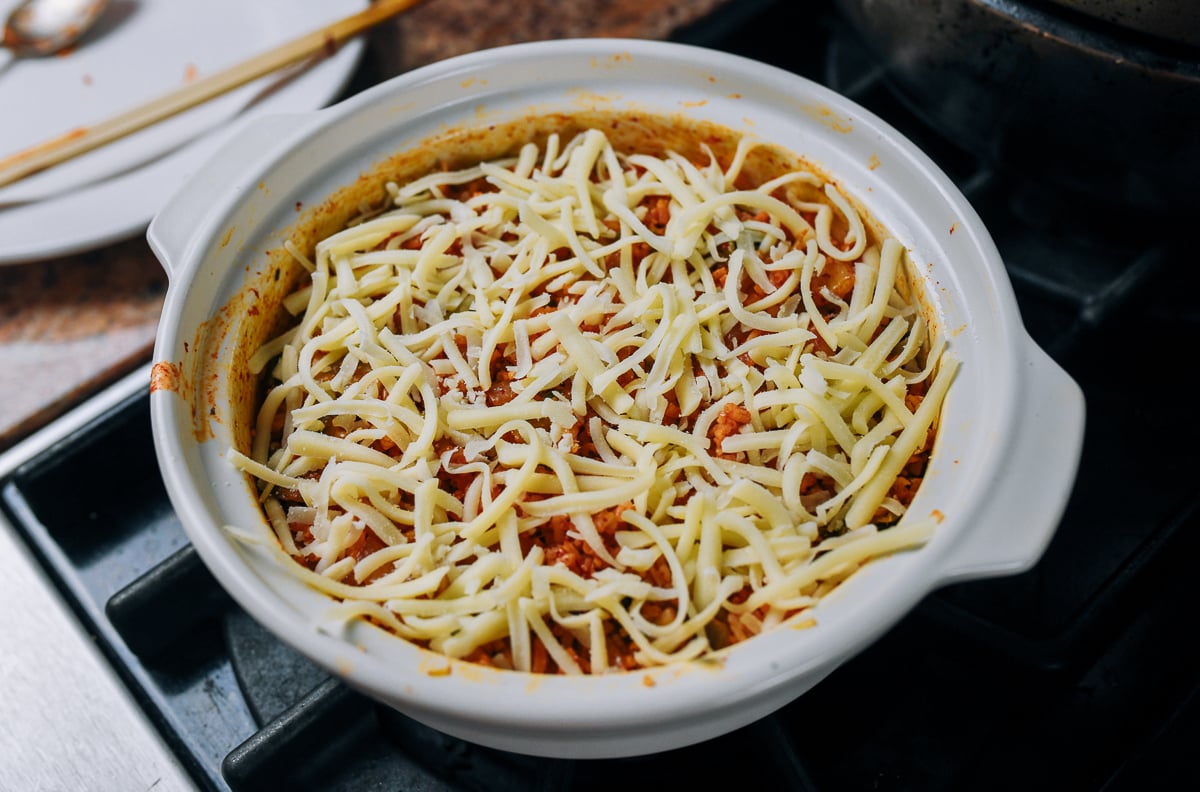 shredded cheese on top of rice