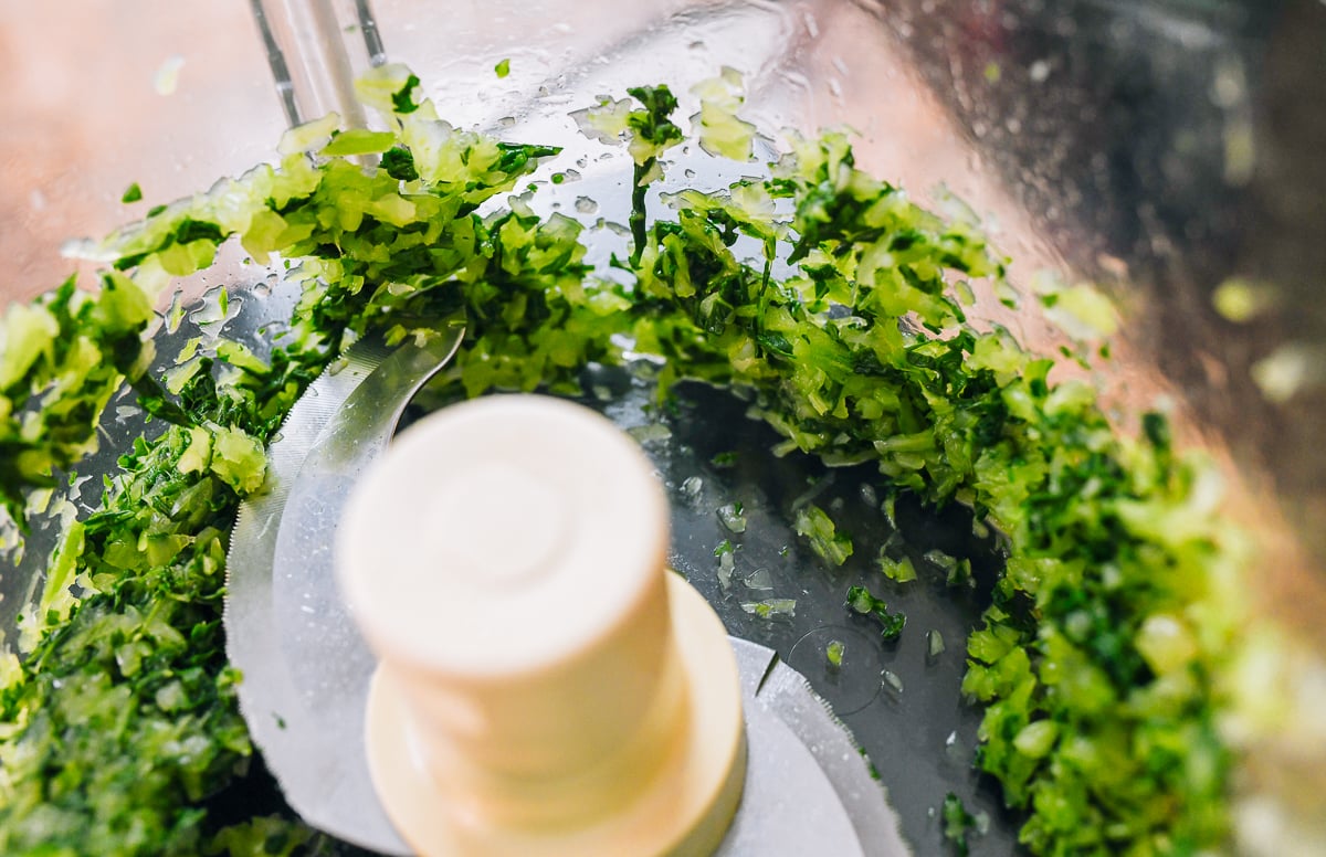 chopped green vegetables in food processor