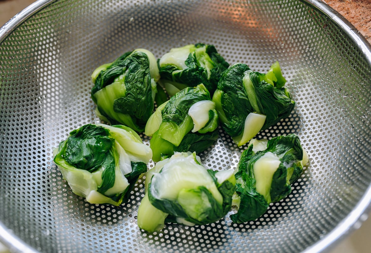 blanched baby bok choy with water squeezed out