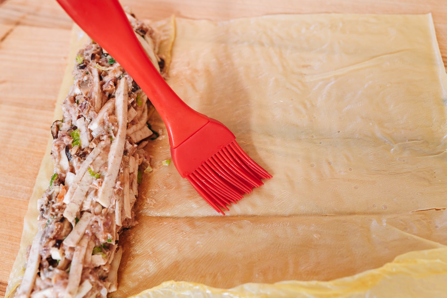 brushing bean curd skin with water