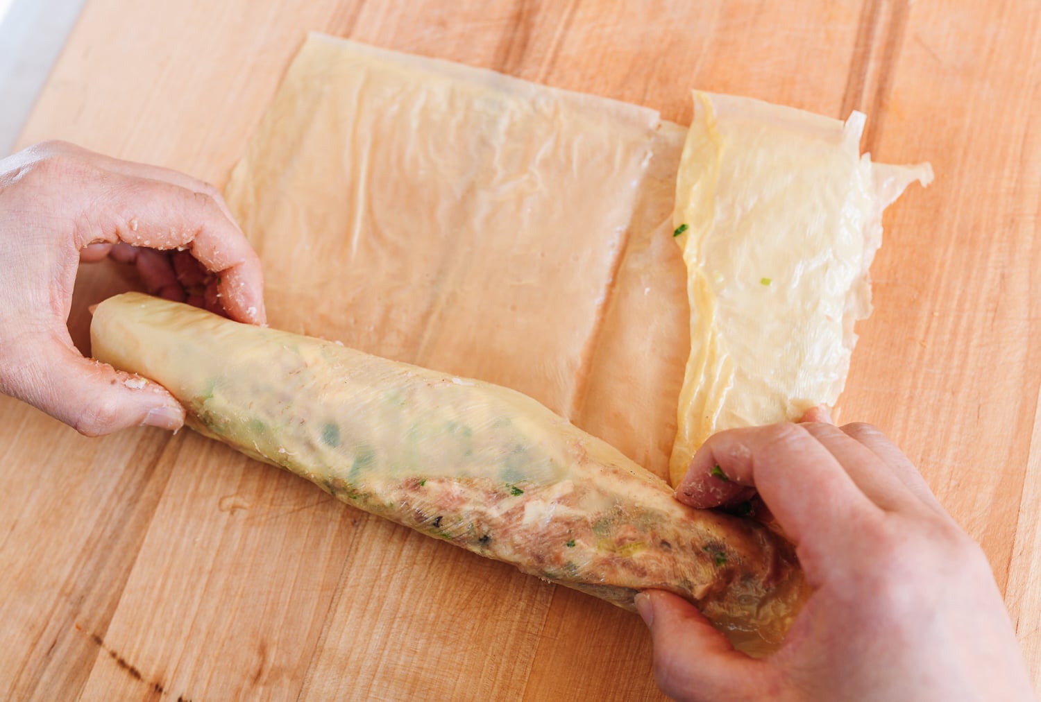 rolling taro filling in bean curd skin