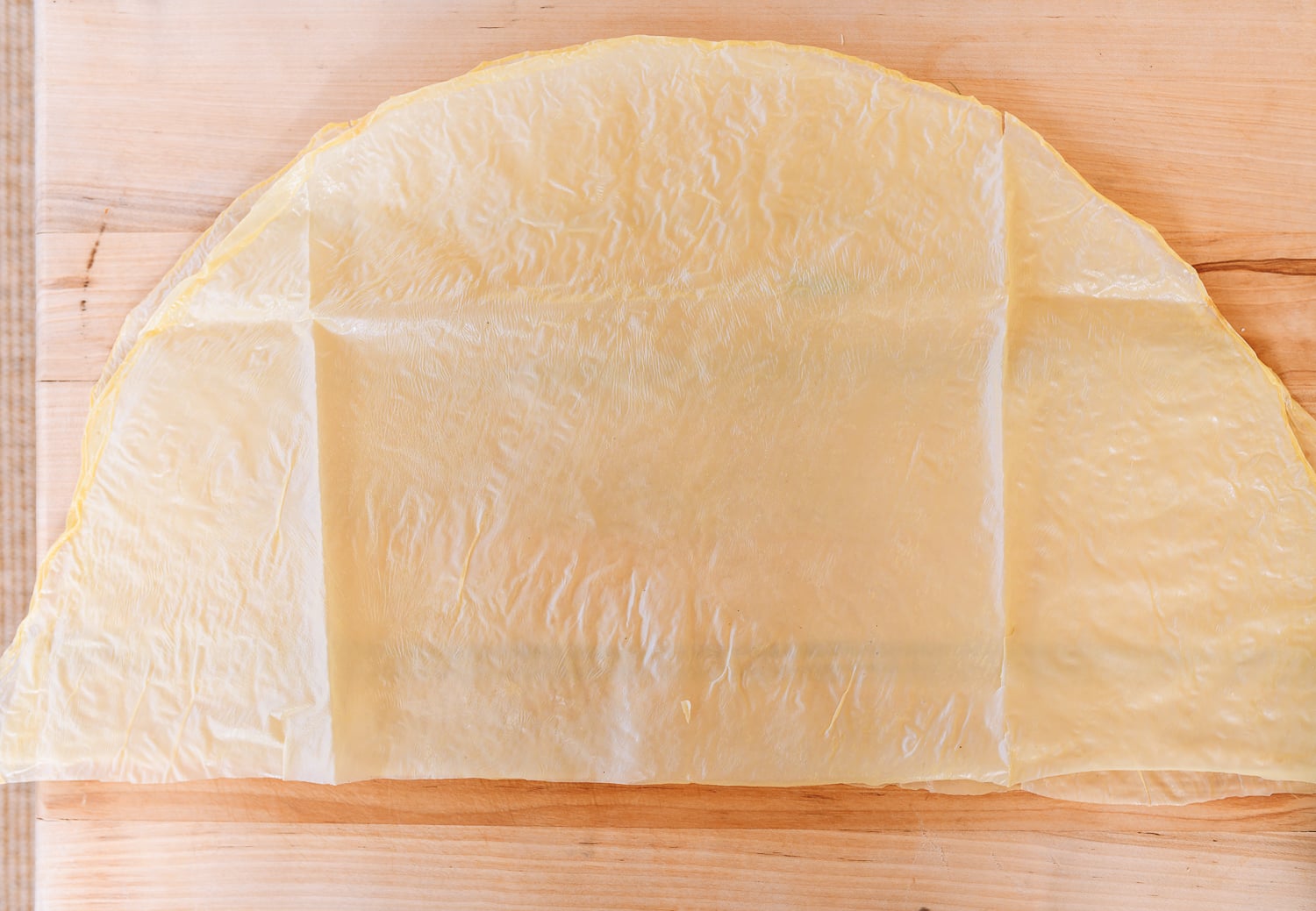 circular bean curd sheet cut in half