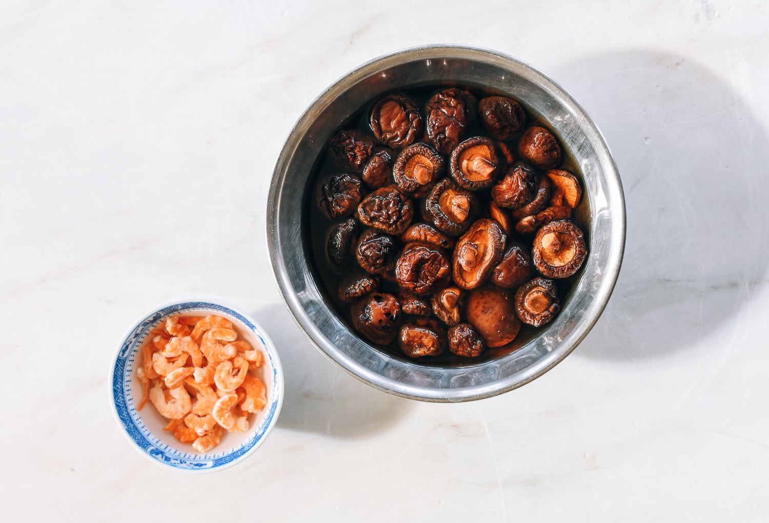 soaking dried shiitake mushrooms and dried shrimp