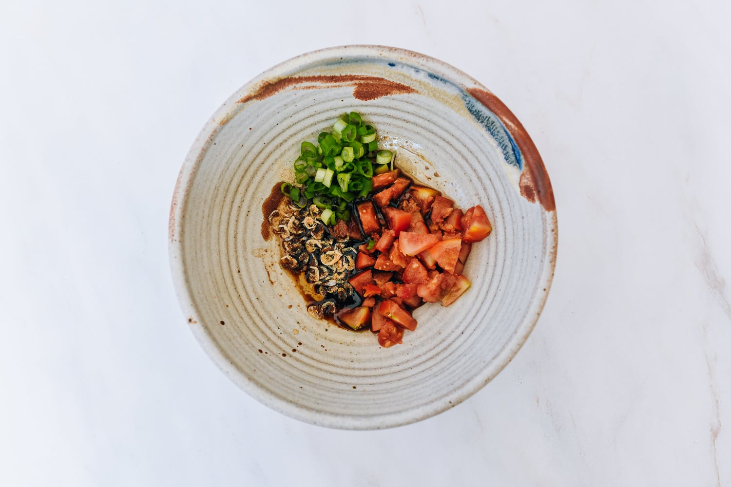 chinese noodle soup base ingredients in bowl