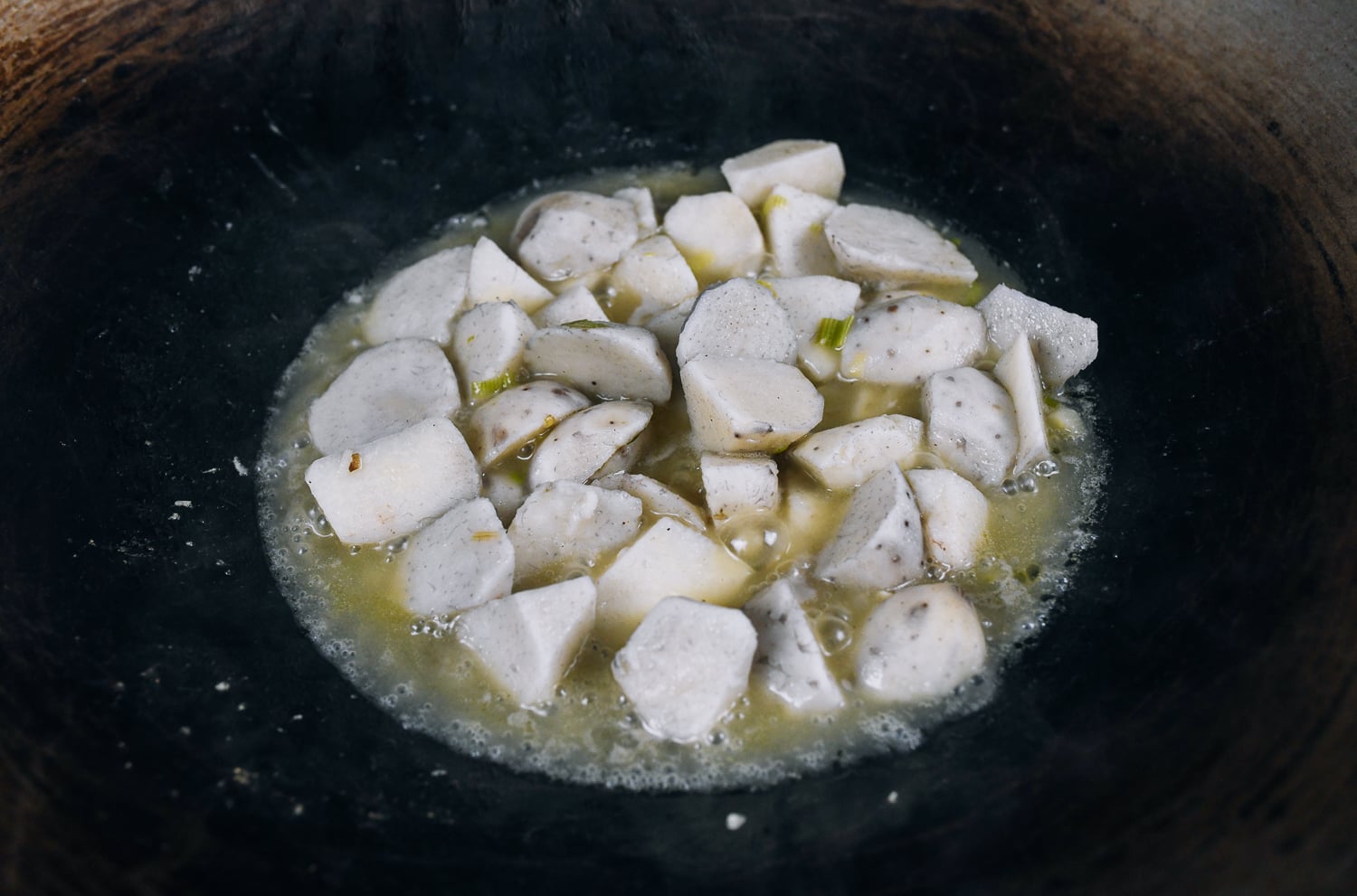 simmering taro with scallions