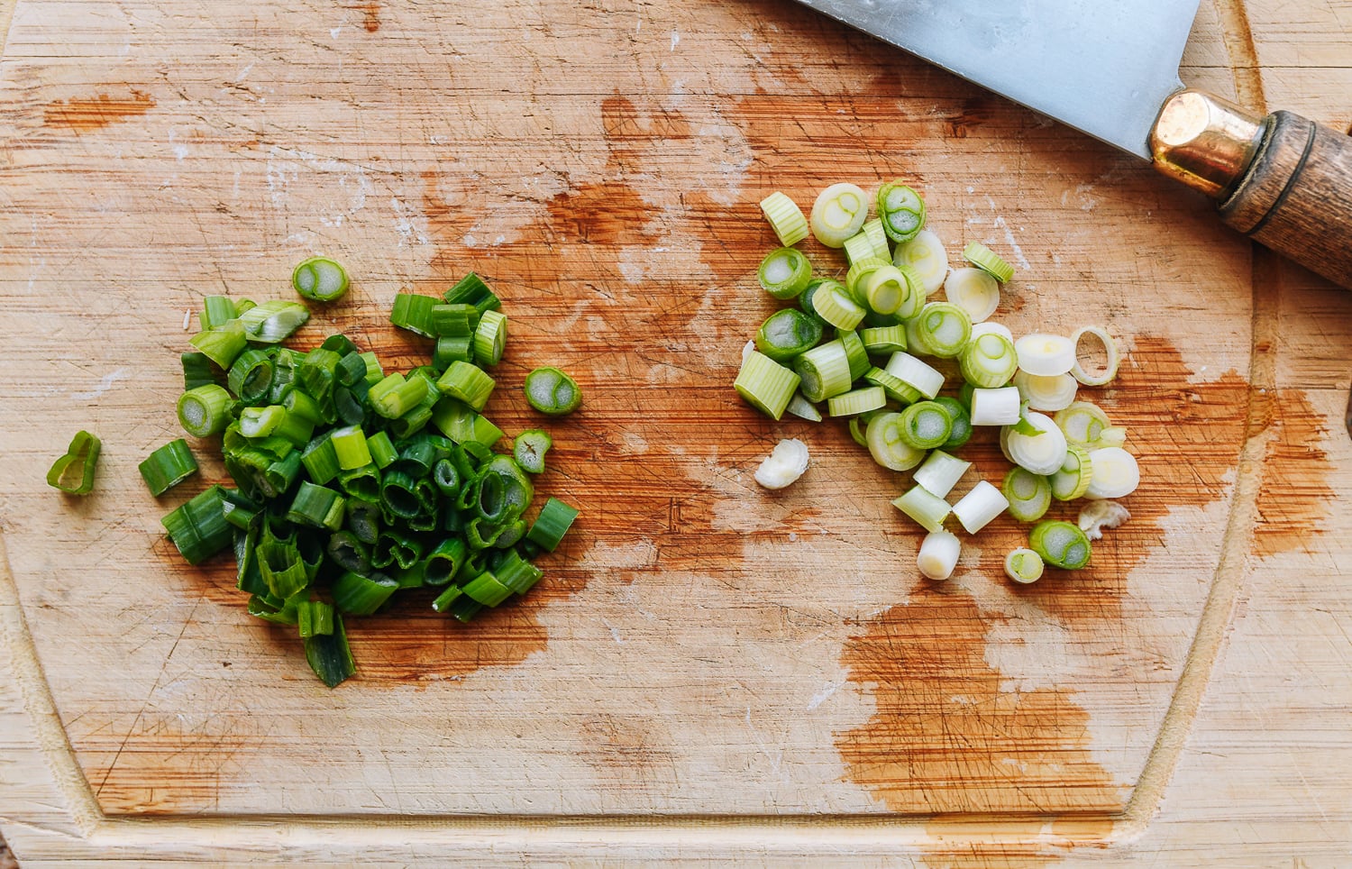 chopped scallion on cutting board