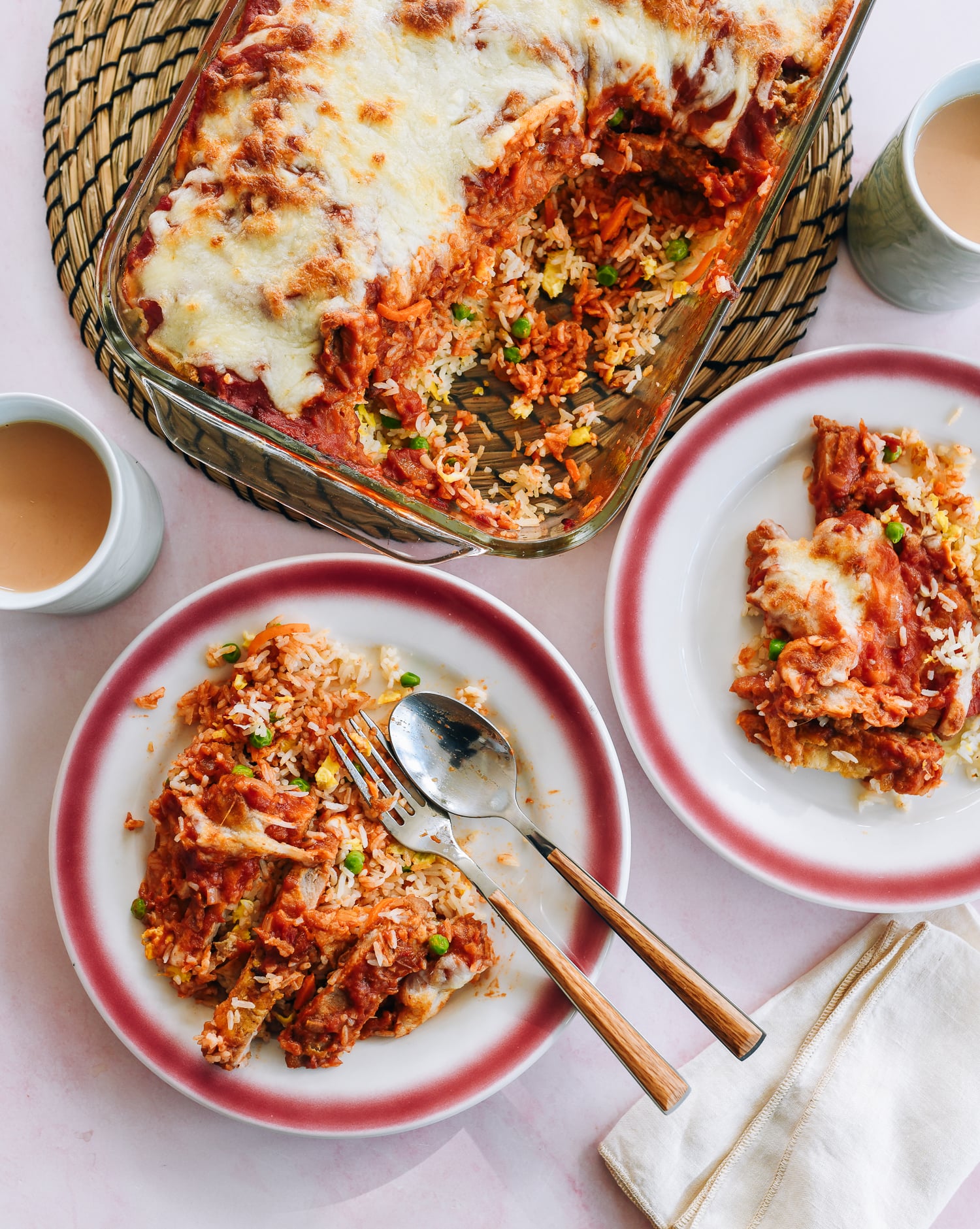 Hong Kong Baked Pork Chop Rice served on plates with milk tea
