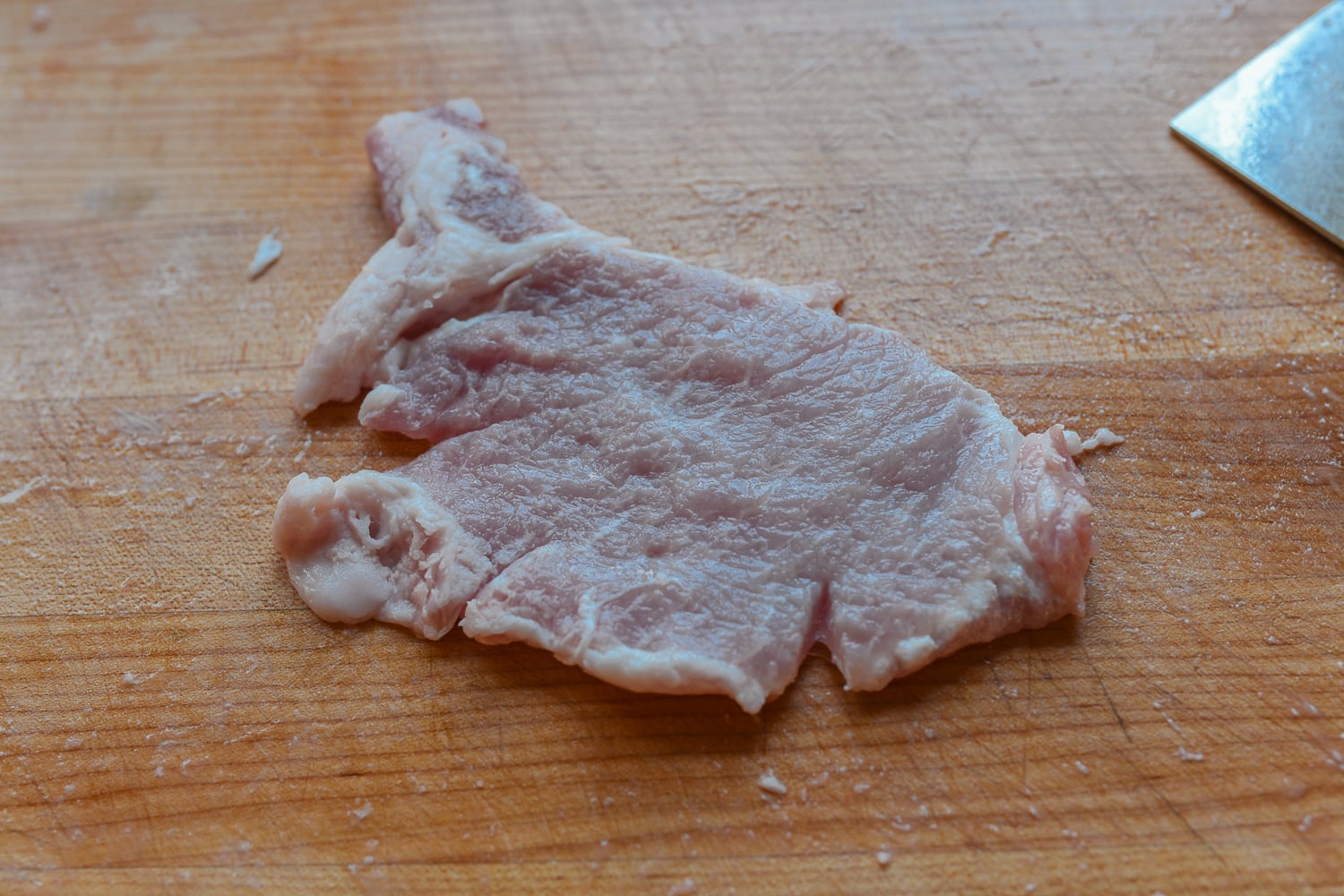 slits cut into pork chops
