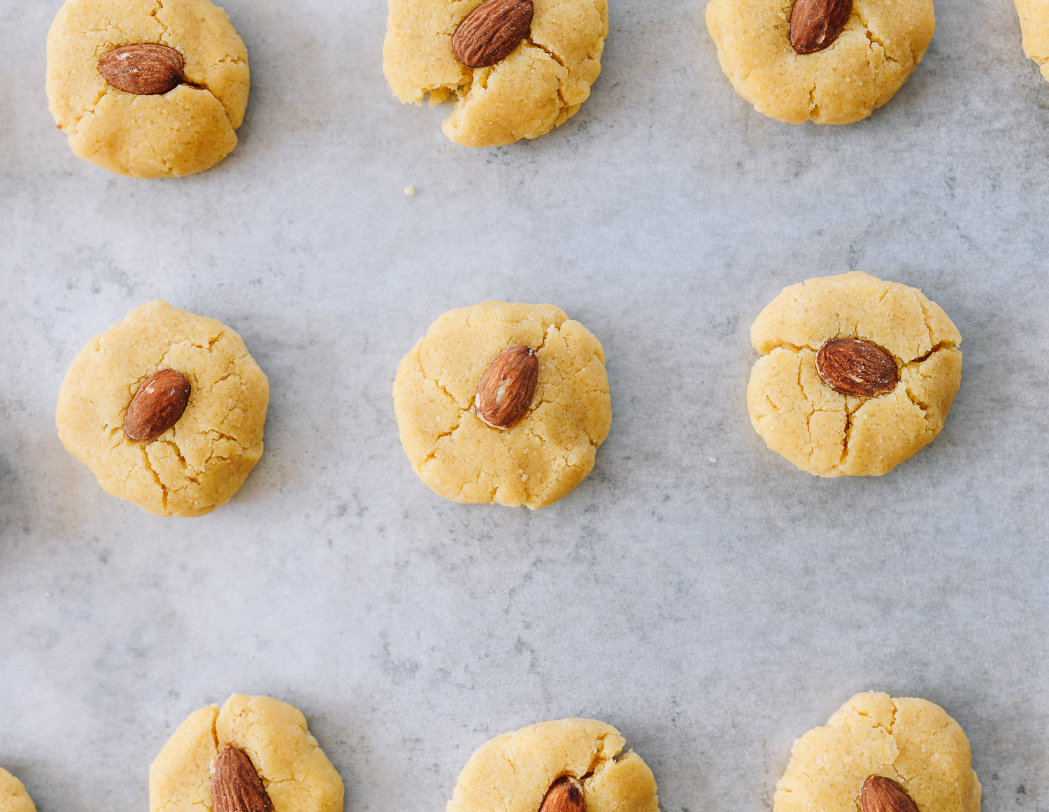 almonds pressed into cookie dough