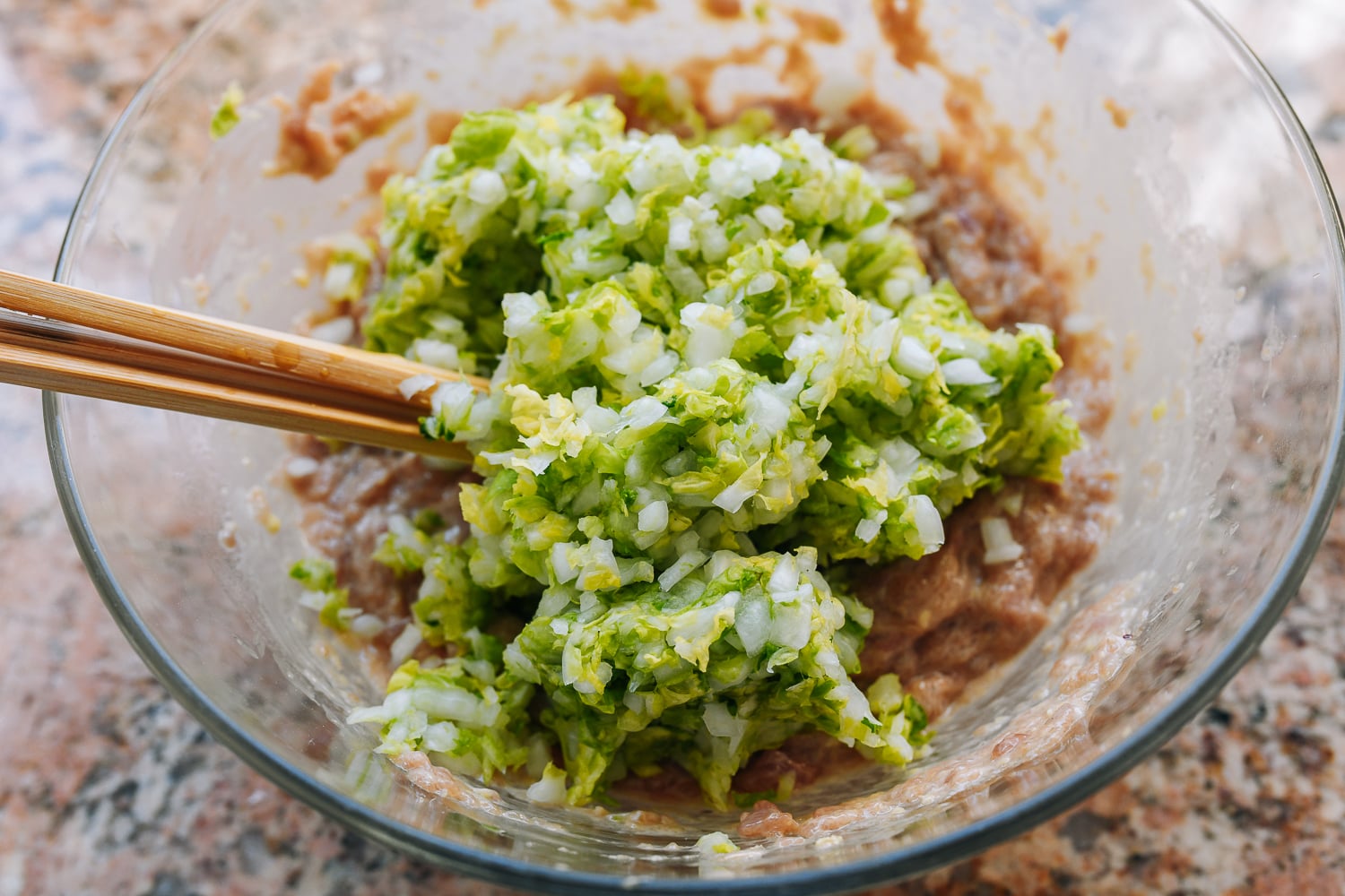 napa cabbage added to chicken dumpling filling