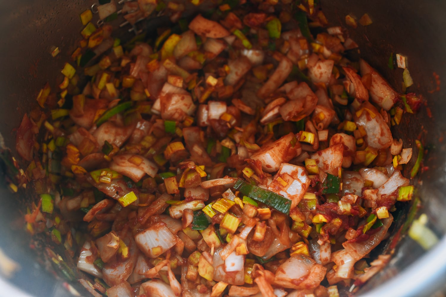 cooking vegetables and tomato paste in instant pot on saute setting