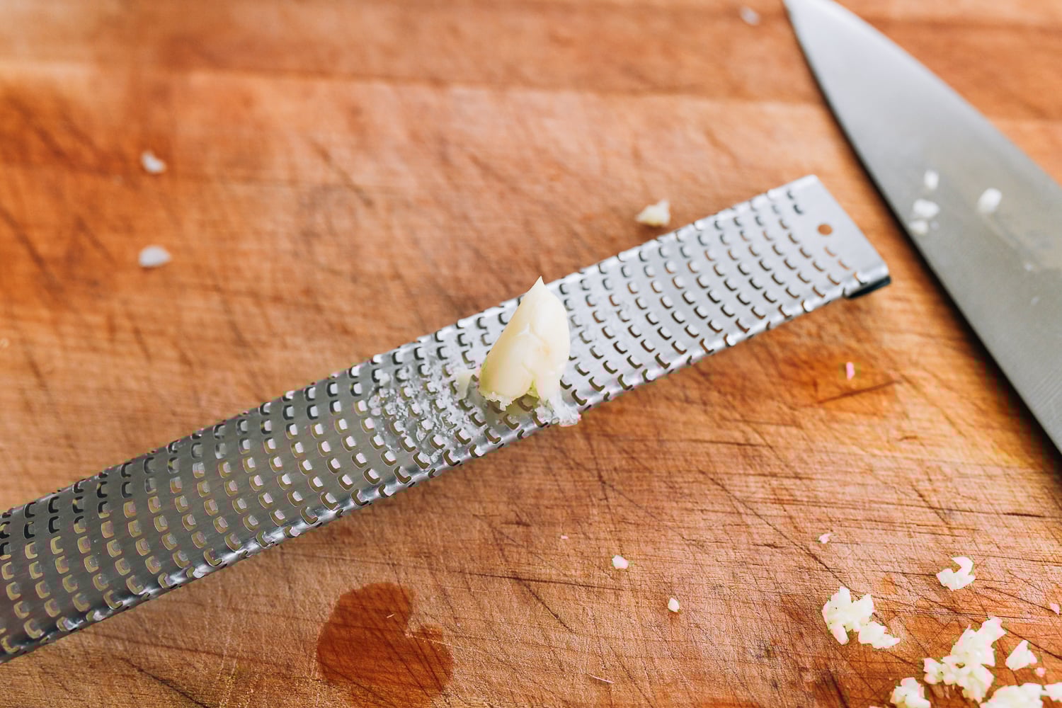 grating garlic with a microplane
