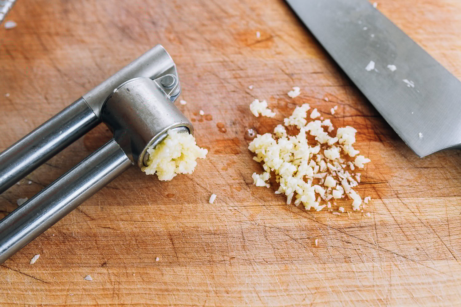 using garlic crusher