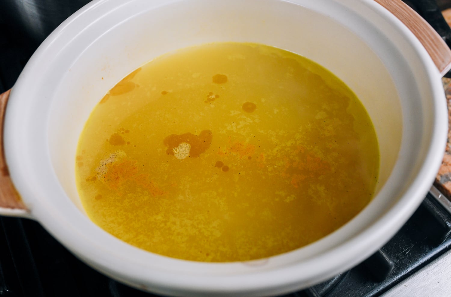 broth and seasonings in pot