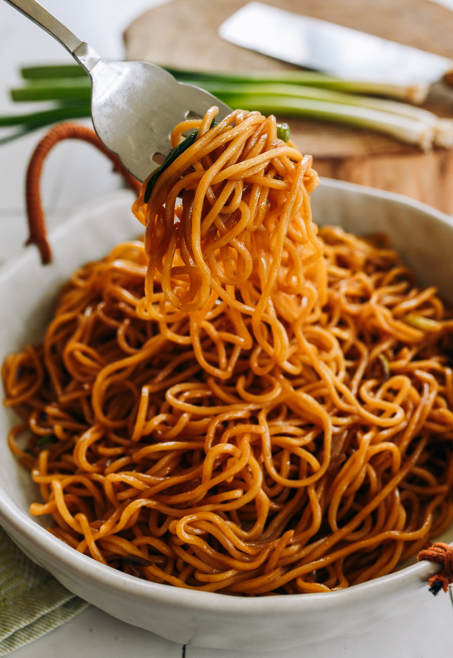 picking up 5-ingredient lo mein with fork