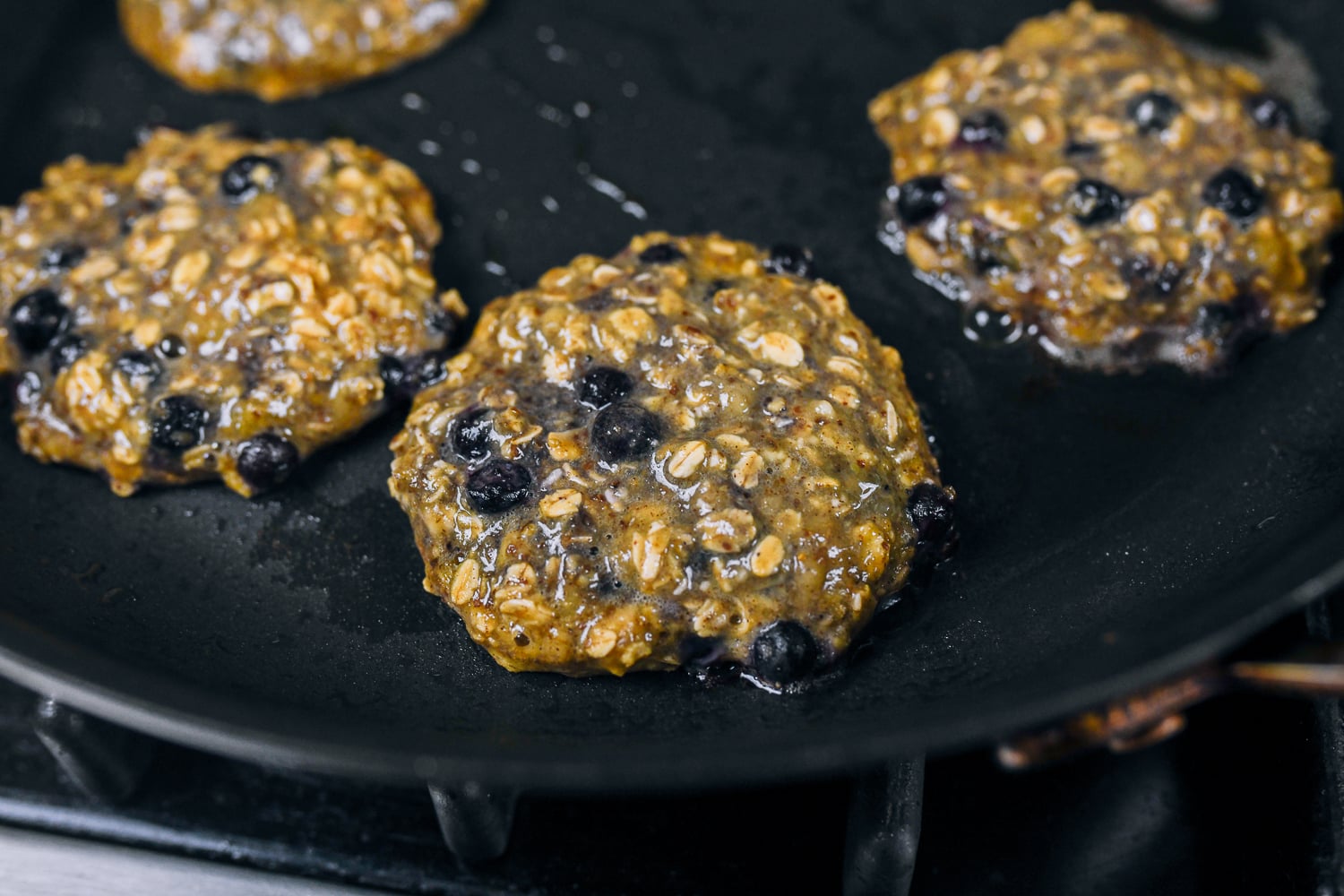 banana oat blueberry pancake batter in pan