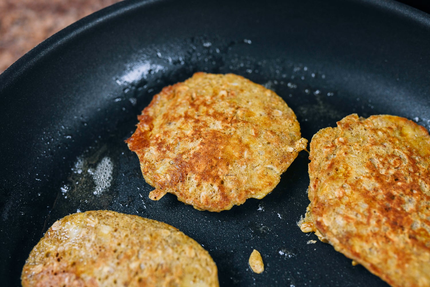 cooked banana oat pancake in pan