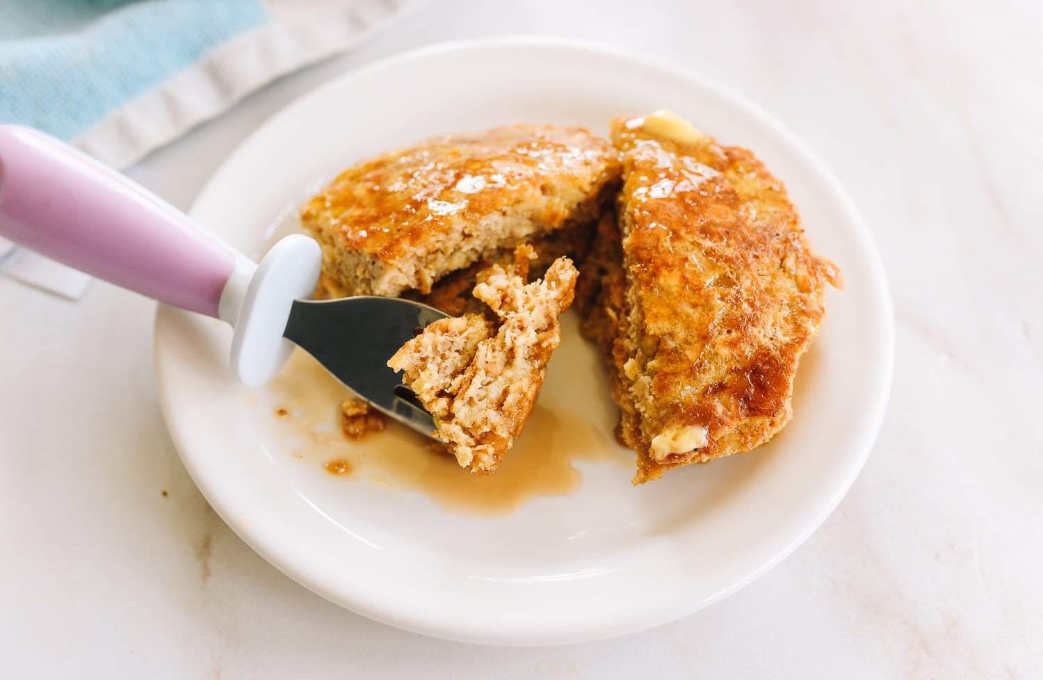 Banana oat pancakes with maple syrup