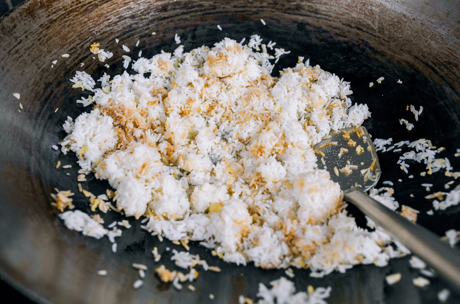 making garlic fried rice