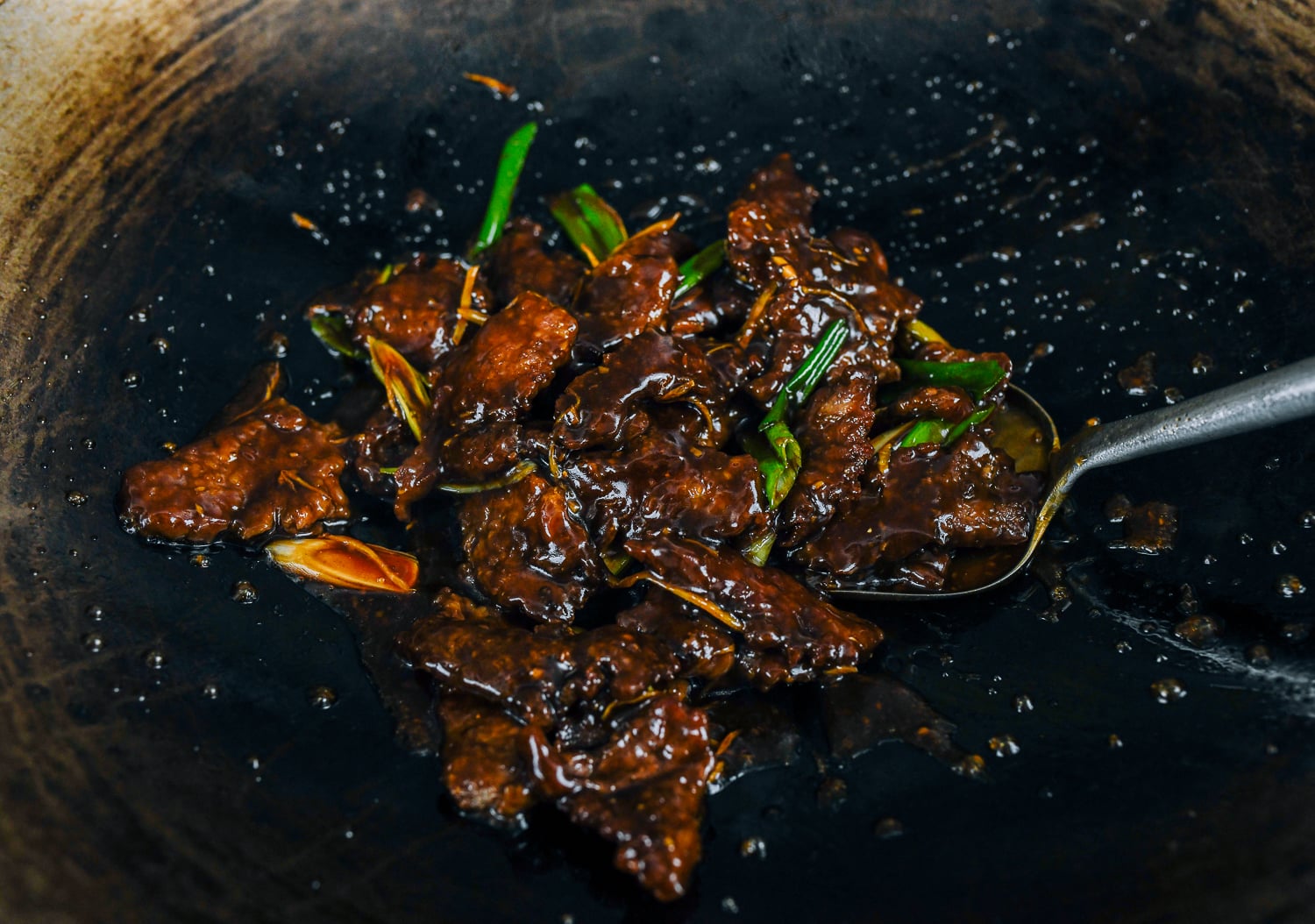 saucy ginger beef in wok