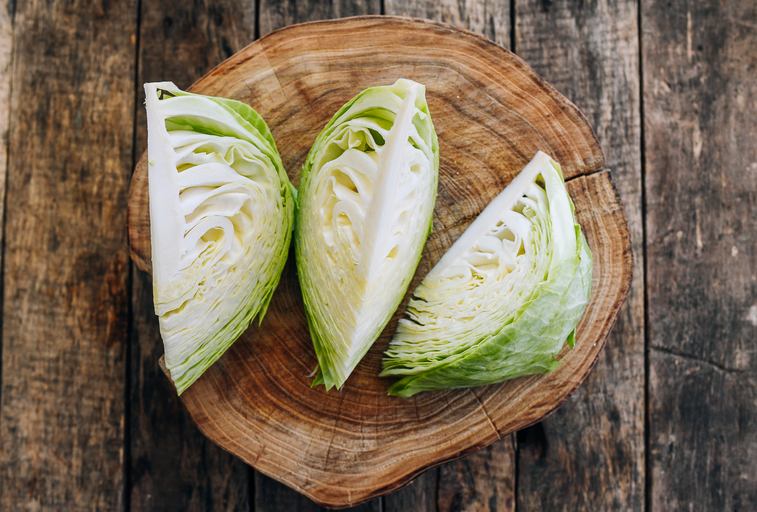 half a cabbage cut into three wedges