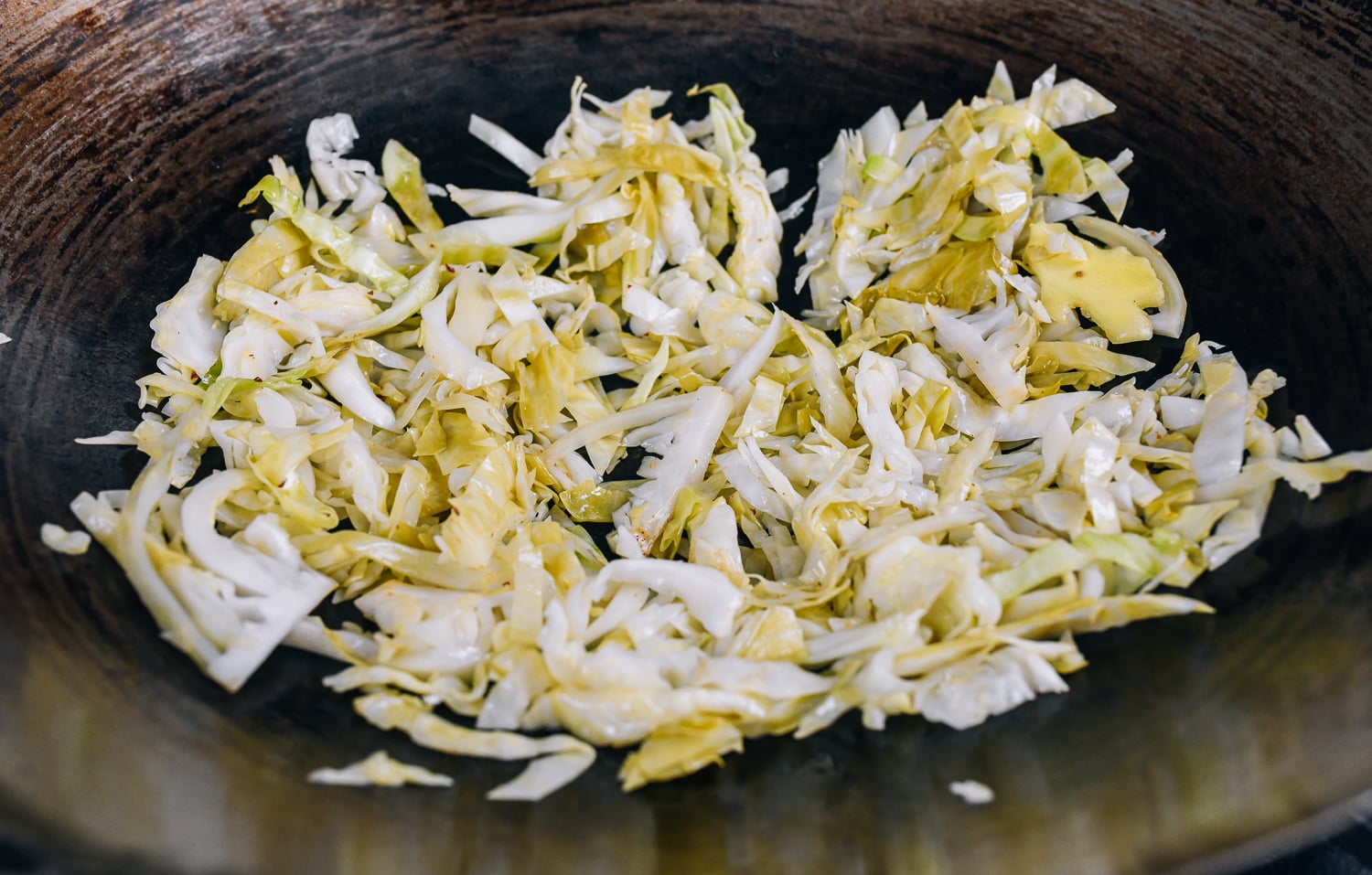 sliced pickled cabbage in wok