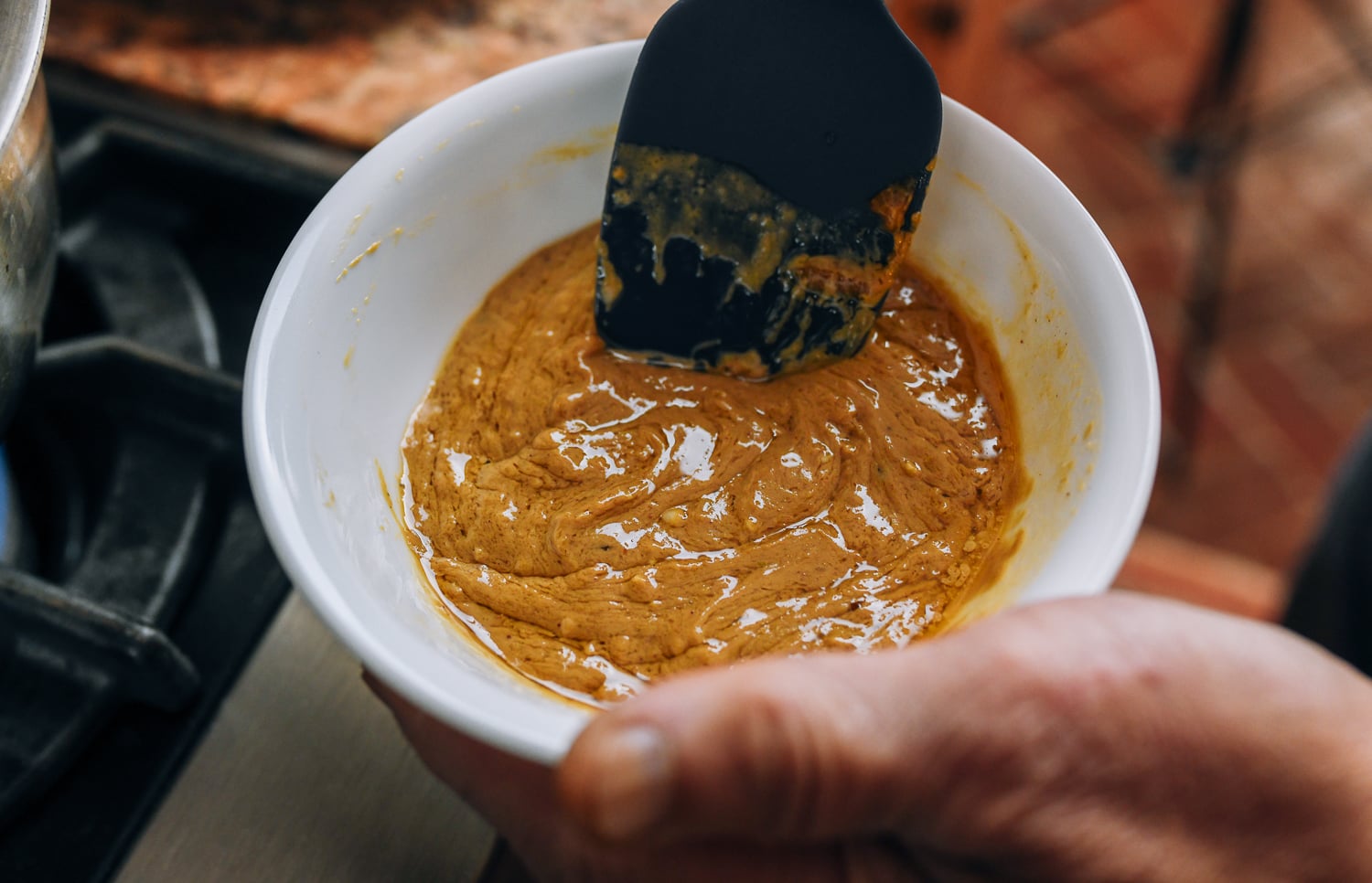 mixing peanut sauce for wontons