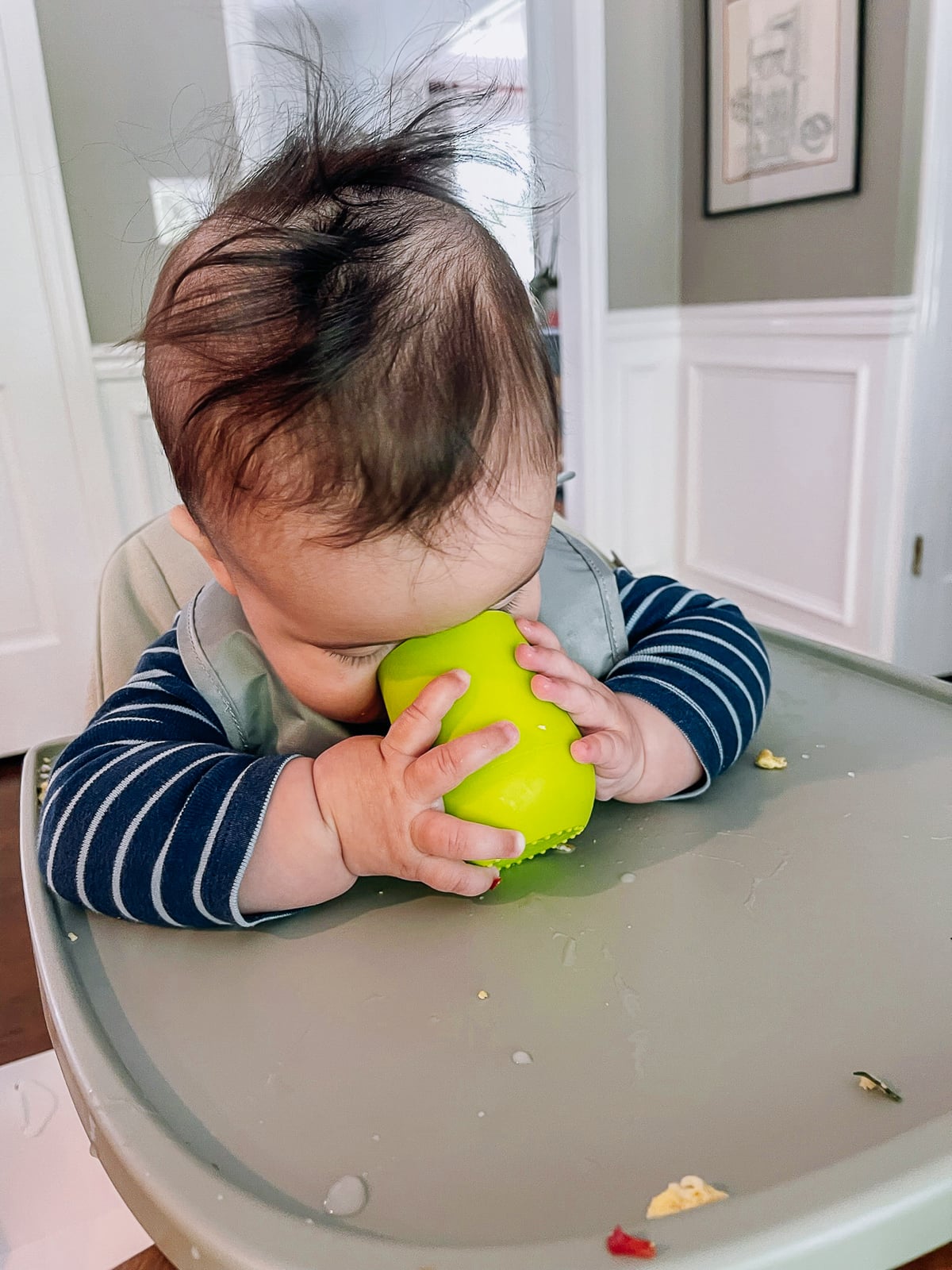 Ethan practicing with open EZPZ cup at 7 months old