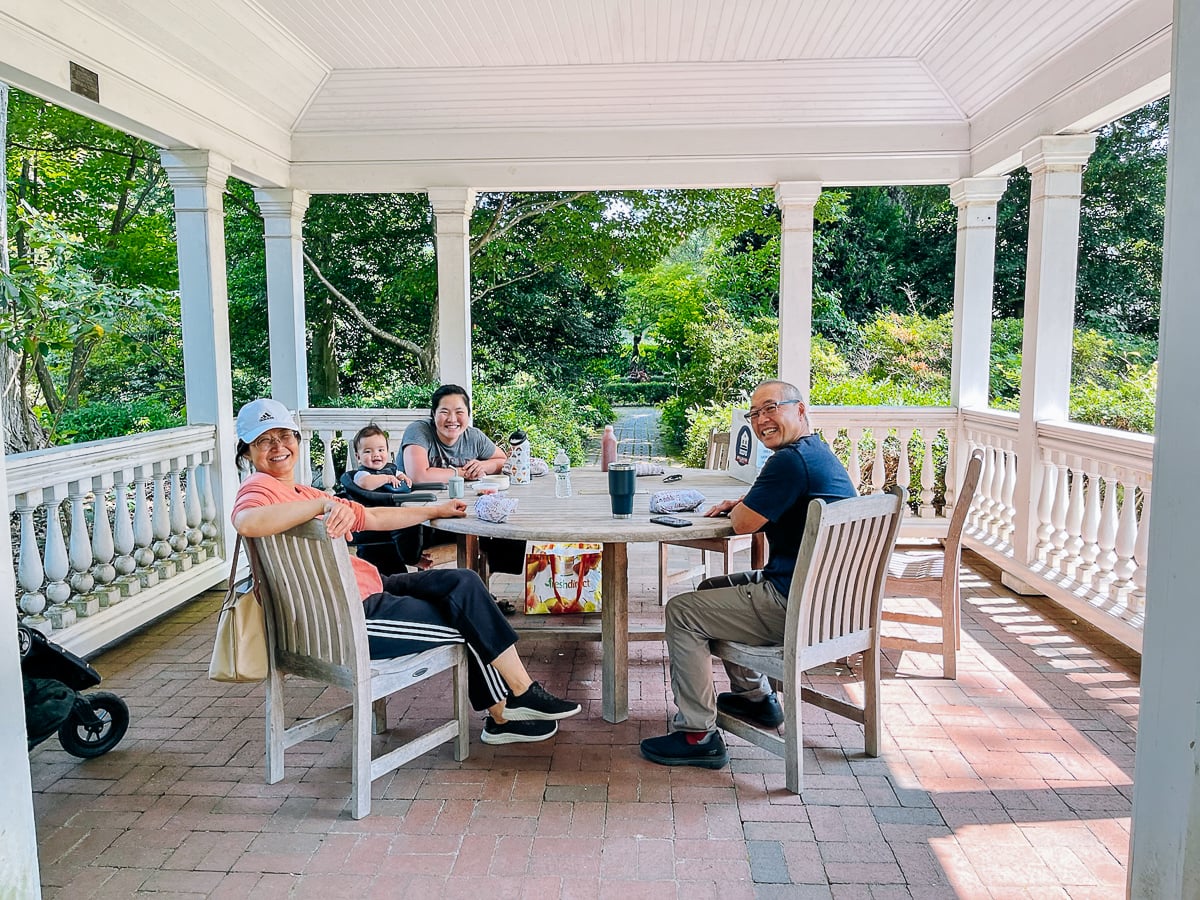 Judy, Ethan, Sarah and Bill dining outdoors