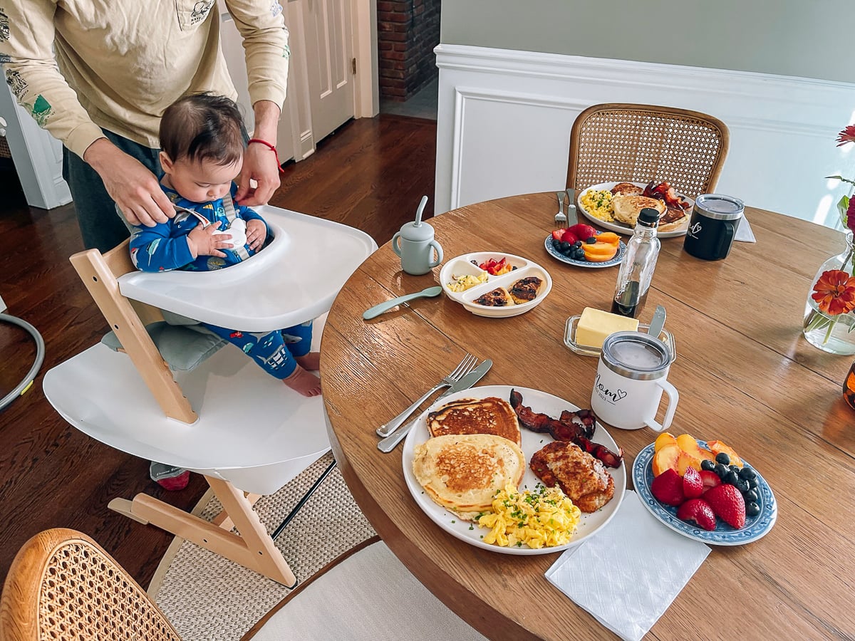 Ethan getting into tripp trapp high chair with catchy