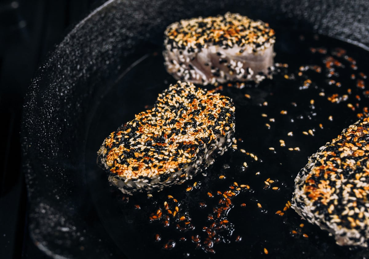 seared sesame tuna steaks in cast iron skillet