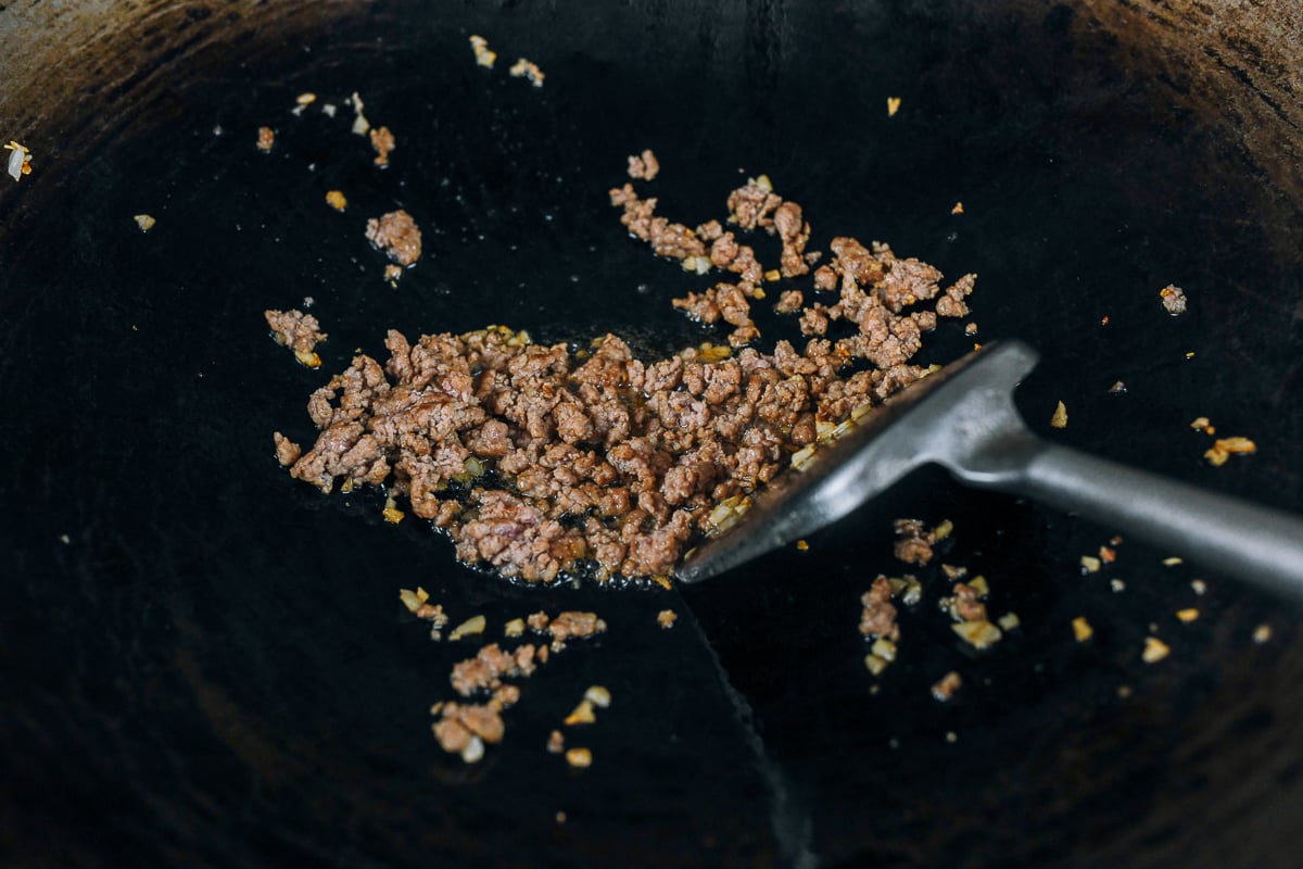 cooking ground pork in wok