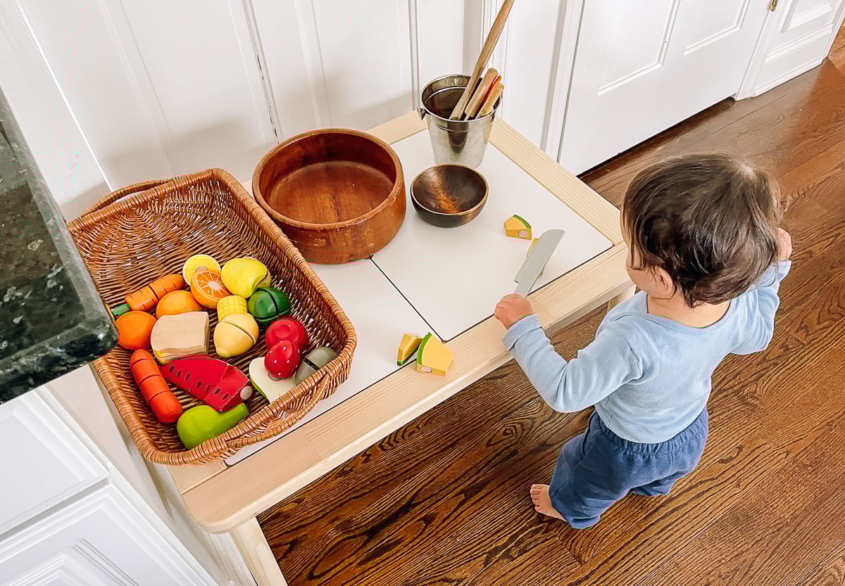 ethan playing kitchen