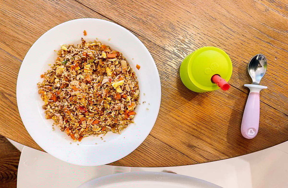 chopped tofu sheet and vegetable stir-fry mixed with quinoa rice