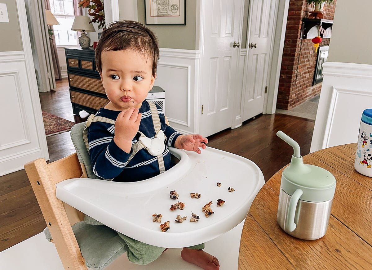 Ethan eating banana blueberry oat pancakes