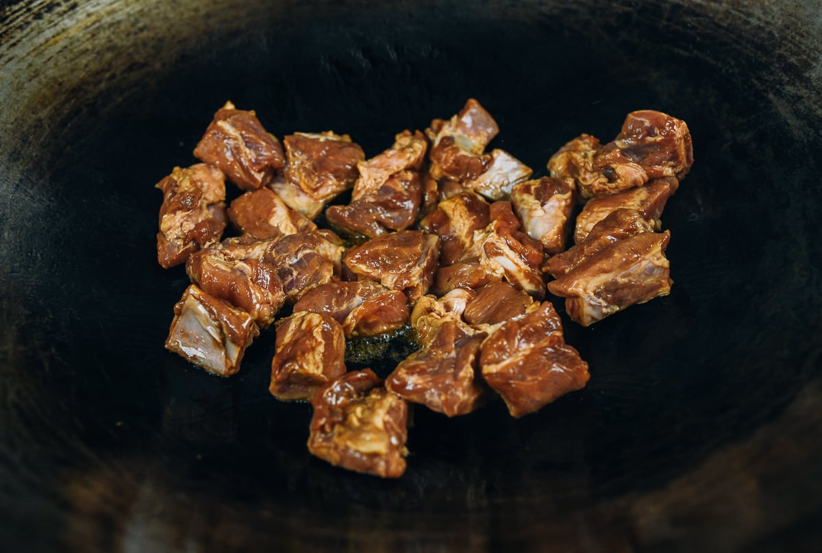 Marinated pork rib pieces  in wok