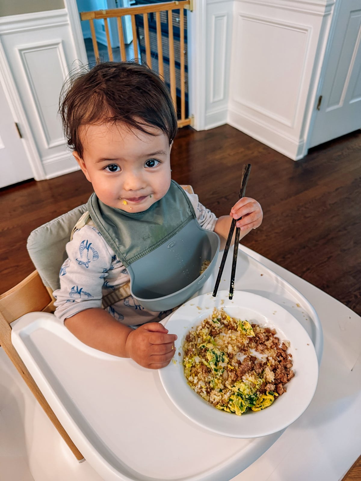 Ethan holding chopsticks