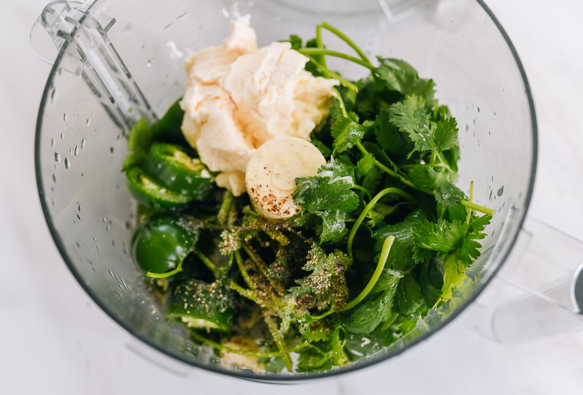 Green sauce ingredients in food processor