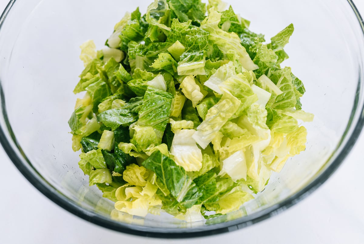 chopped romaine in glass bowl