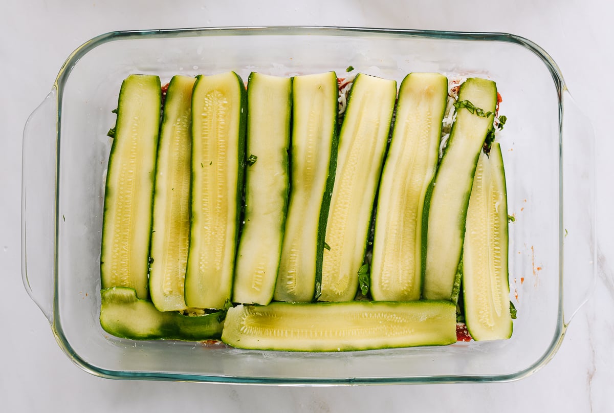 zucchini slices layered in lasagna pan
