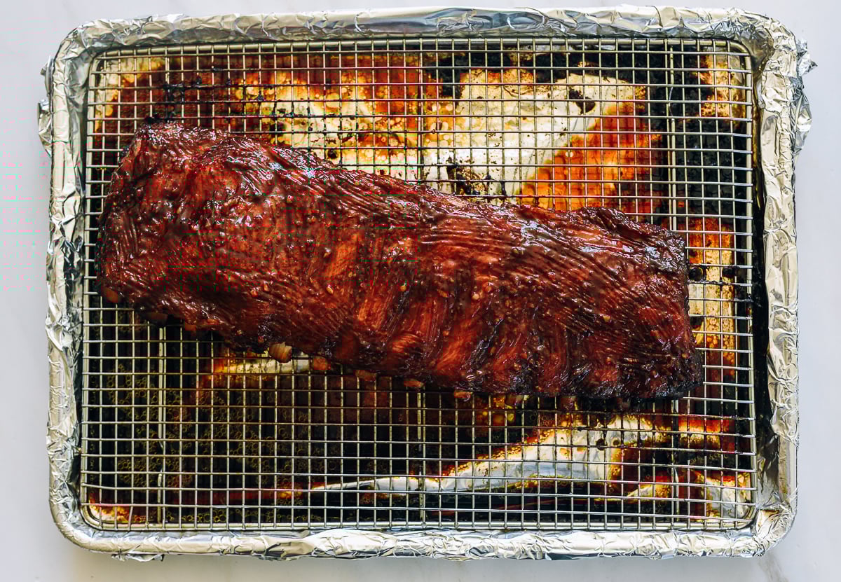 chinese spare ribs on roasting rack after basting