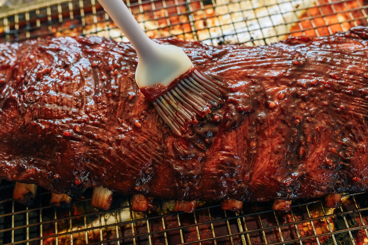 Basting Chinese spare ribs with Chinese bbq sauce