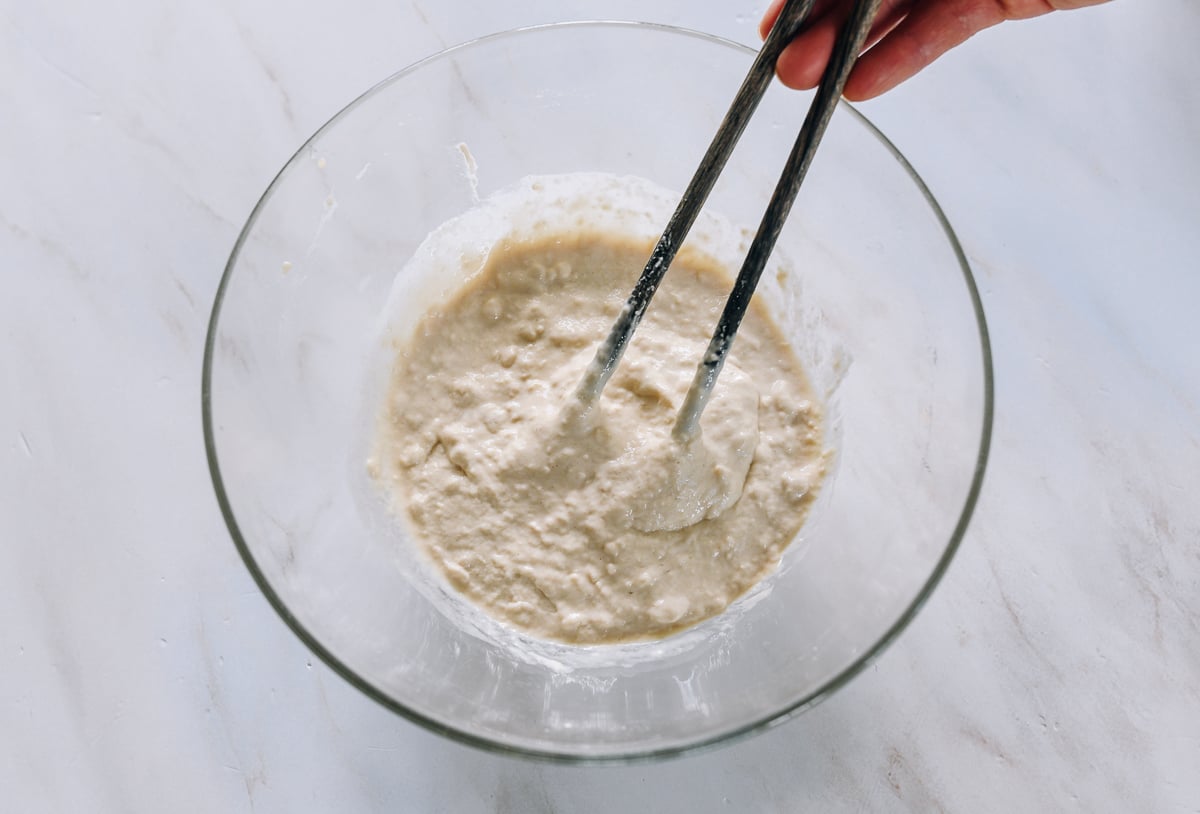 flour and water mixed together in glass bowl