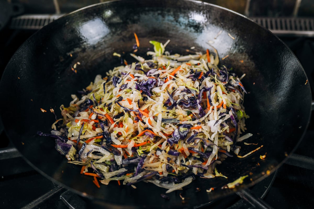 wilted cabbage cole slaw mix in wok